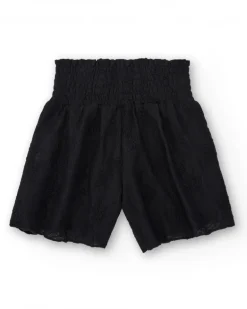 Short pour fille en noir avec taille élastique et imprimé floral.