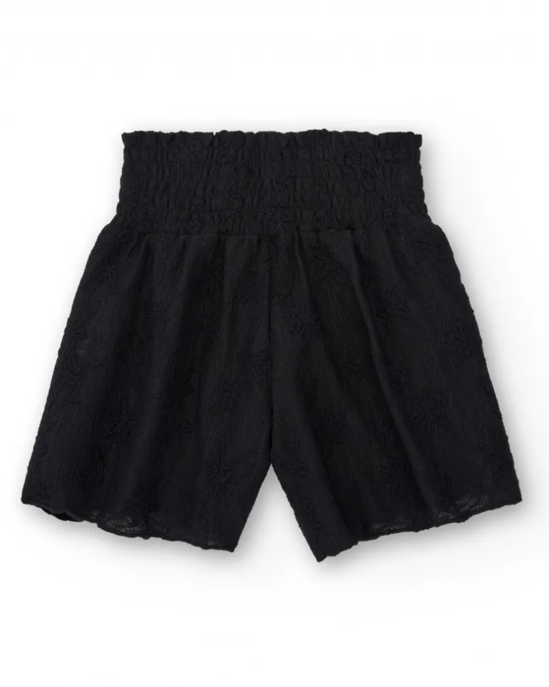 Short pour fille en noir avec taille élastique et imprimé floral.