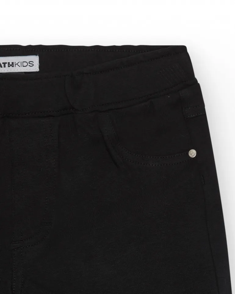 Short pour fille en noir avec taille élastique et poches.
