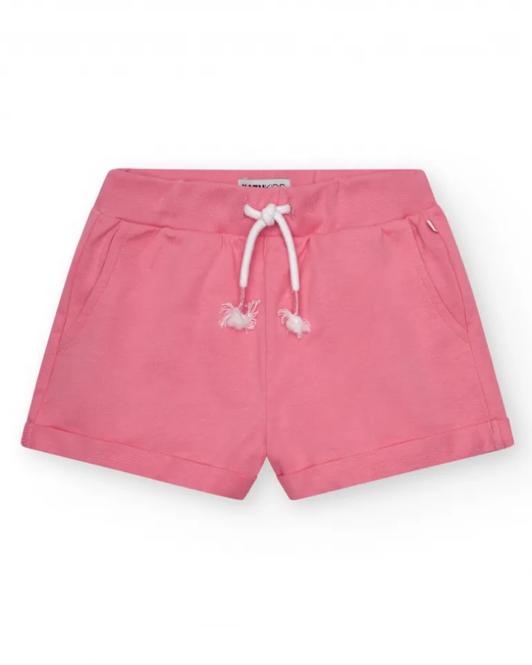 Short pour fille en rose avec taille élastique et poches.
