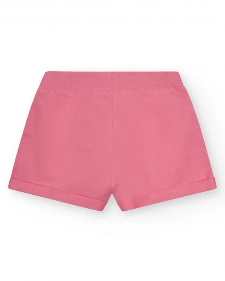Short pour fille en rose avec taille élastique et poches.