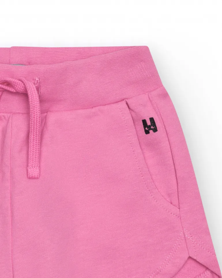 Short pour fille en rose fuchsia avec taille élastique et poches.