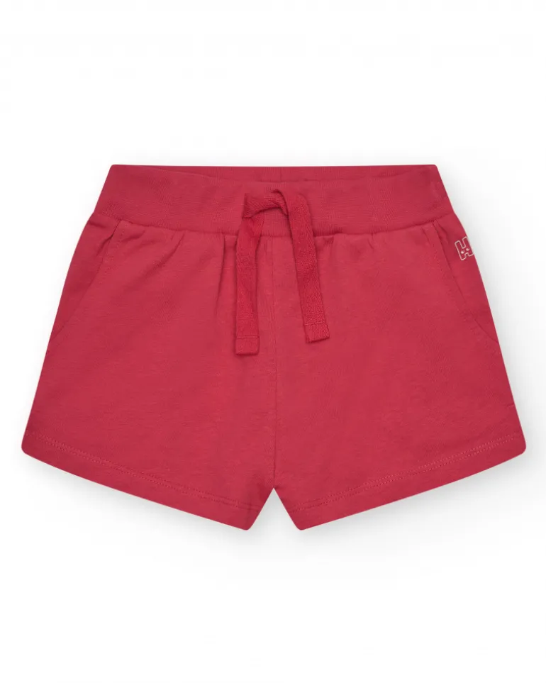 Short pour fille en rouge avec taille élastique et poches.