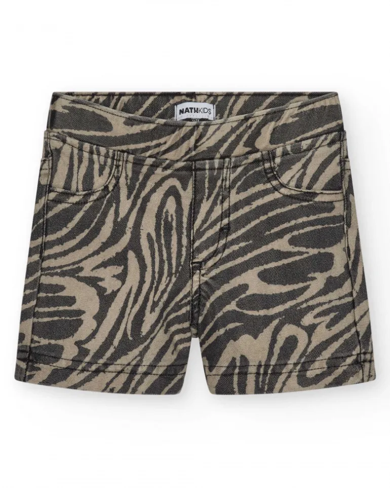 Short pour fille en vert avec poches et taille élastique.