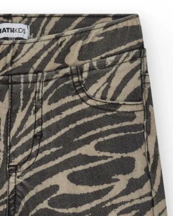 Short pour fille en vert avec poches et taille élastique.