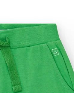 Short pour fille en vert avec taille élastique et poches.