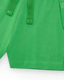 Short pour fille en vert avec taille élastique et poches.