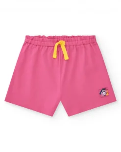 Short rose pour fille avec cordon jaune et écusson