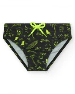 Slip de bain noir pour garçon avec imprimé surfeur et cordon fluo.