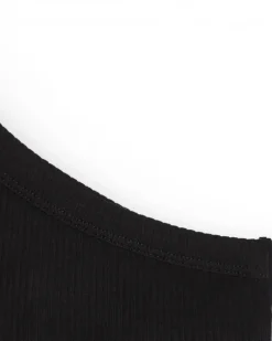 Top asymétrique pour fille en noir avec motif floral.