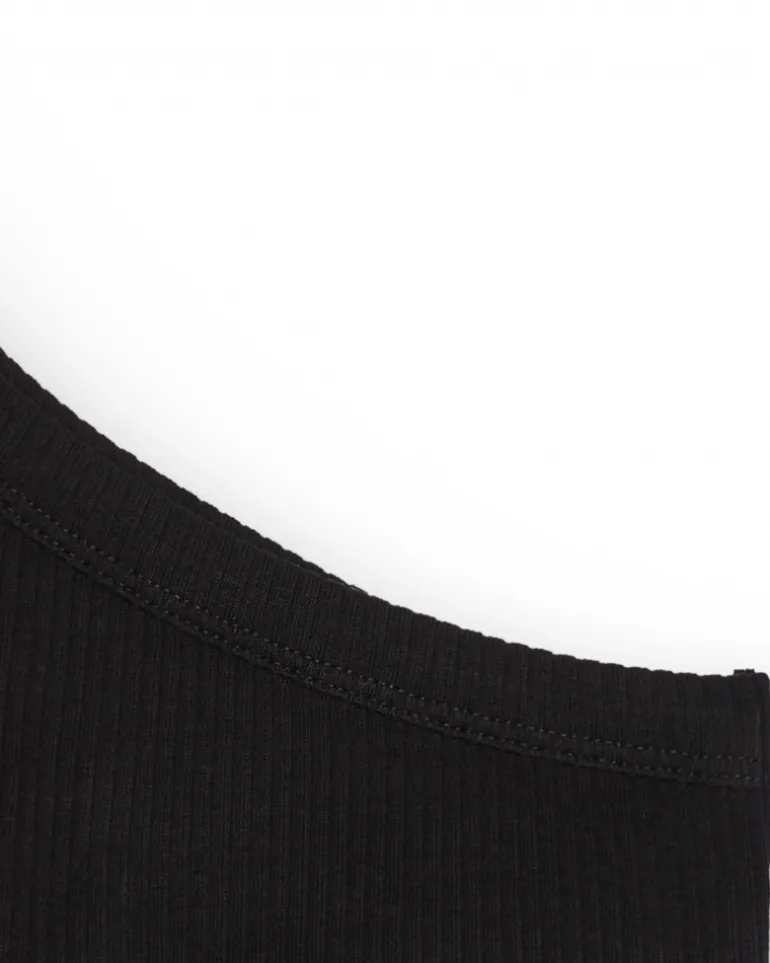 Top asymétrique pour fille en noir avec motif floral.