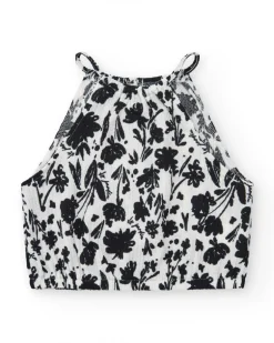 Top pour fille en blanc avec bretelles et imprimé floral.