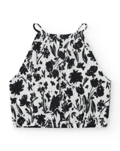 Top pour fille en blanc avec bretelles et imprimé floral.