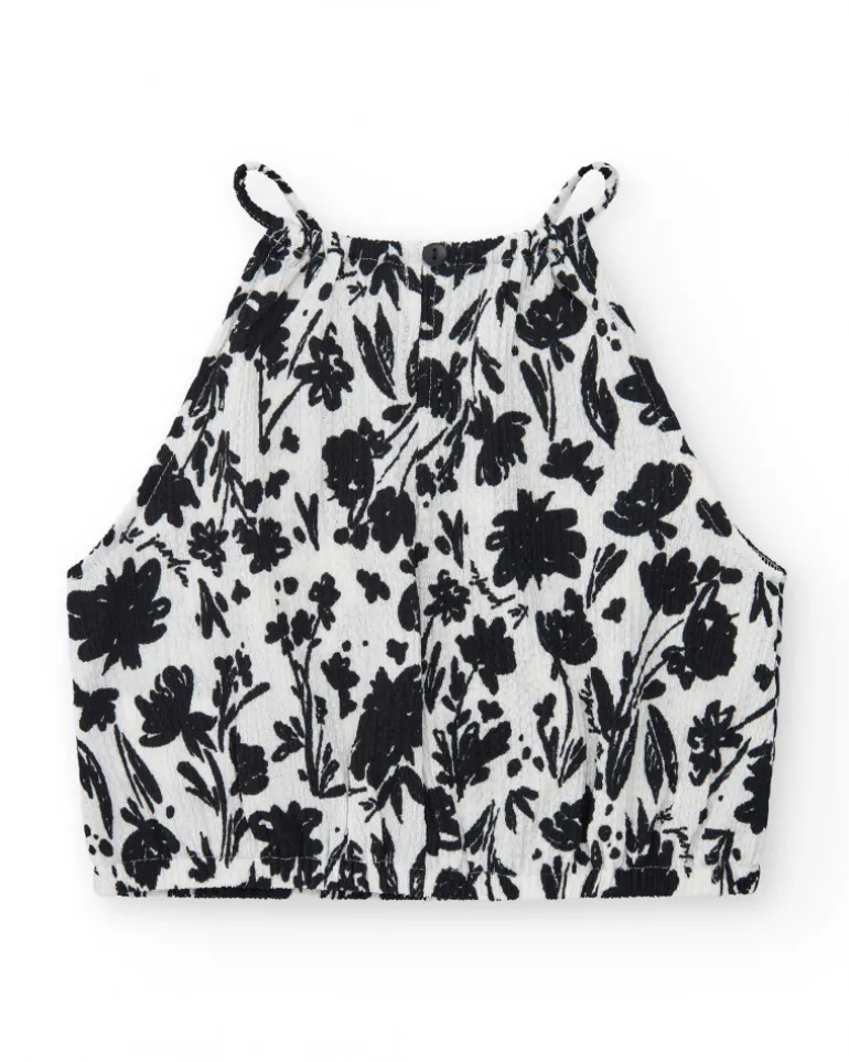 Top pour fille en blanc avec bretelles et imprimé floral.