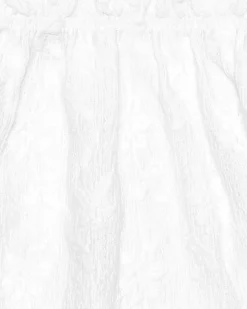 Top pour fille en blanc avec manches larges et épaules dénudées.