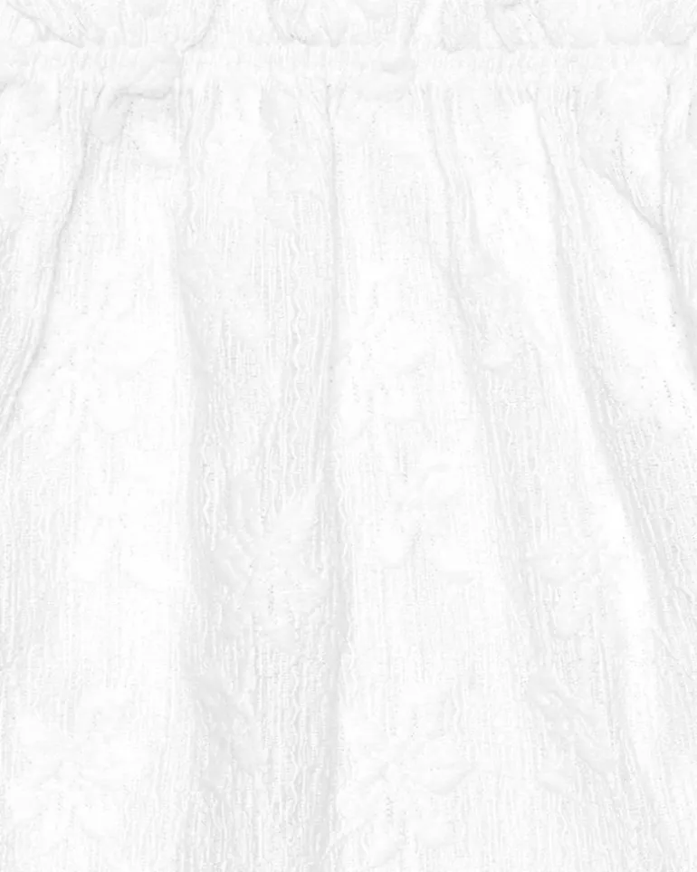 Top pour fille en blanc avec manches larges et épaules dénudées.