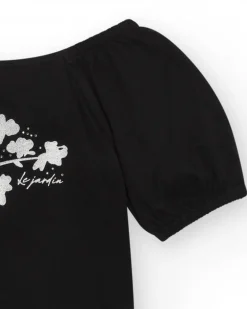 T-shirt à manches courtes pour fille en noir avec manches bouffantes.
