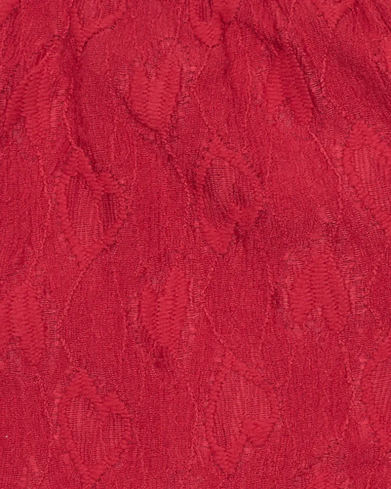 T-shirt à manches courtes pour fille en rouge avec col et manches bouffantes.