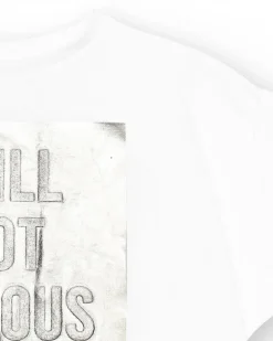 T-shirt à manches courtes pour fille en blanc avec imprimé métallique.
