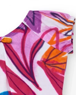 T-shirt pour fille en blanc avec imprimé tropical et nœud dans le dos.