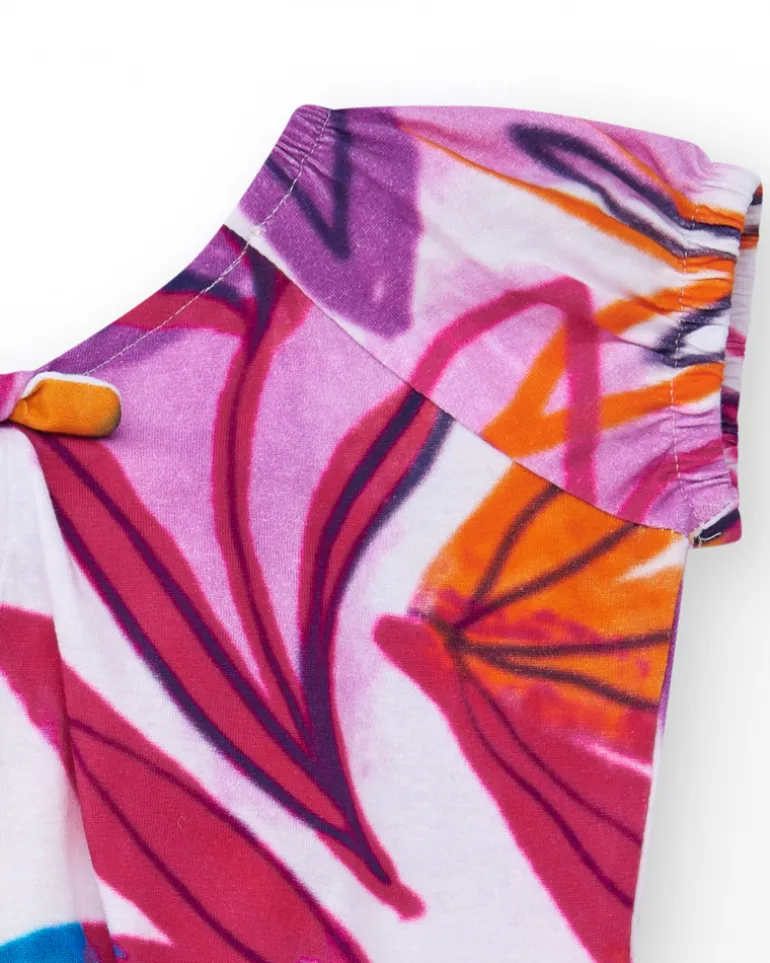 T-shirt pour fille en blanc avec imprimé tropical et nœud dans le dos.