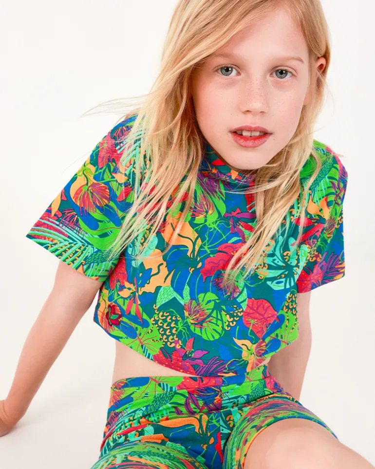 T-shirt pour fille en bleu à manches longues avec imprimé tropical.