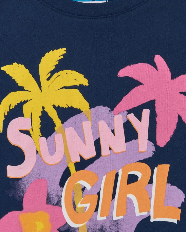 T-shirt pour fille en bleu, manches courtes avec imprimé tropical.