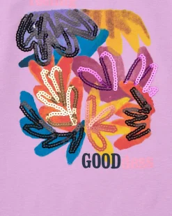T-shirt pour fille en lilas avec sequins et ourlet courbé.