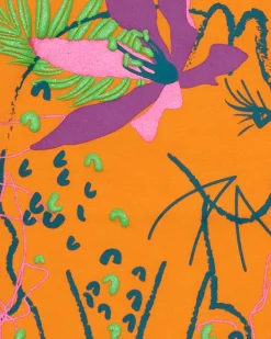 T-shirt pour fille en orange à manches courtes avec détails floraux.