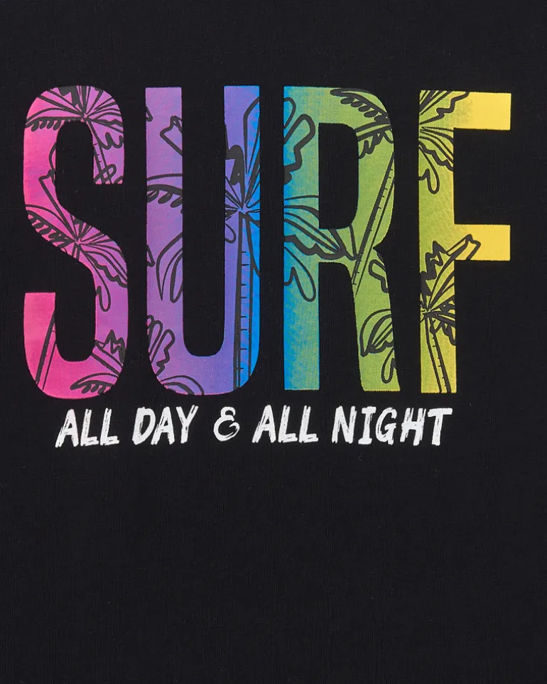 T-shirt pour garçon en noir avec imprimé multicolore.