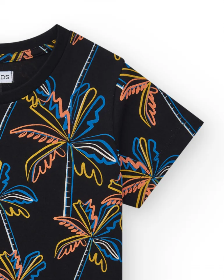 T-shirt pour garçon en noir avec imprimé tropical.