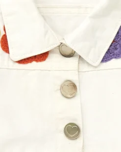 Veste blanche en toile pour fille avec boutons et volant inférieur