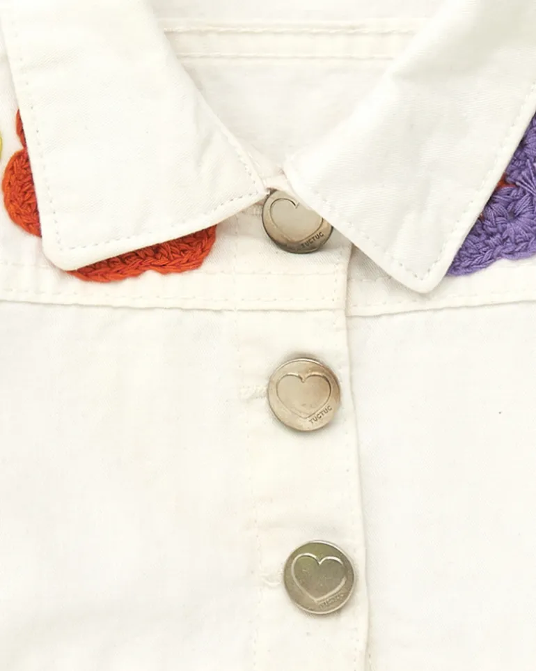 Veste blanche en toile pour fille avec boutons et volant inférieur