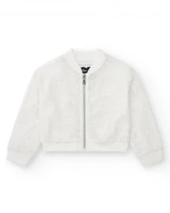 Veste pour fille en blanc avec sequins et fermeture éclair sur le devant.
