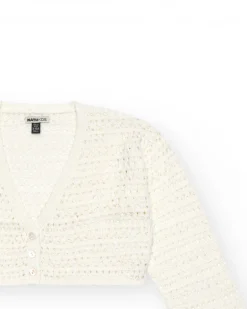 Veste pour fille en blanc avec boutons.