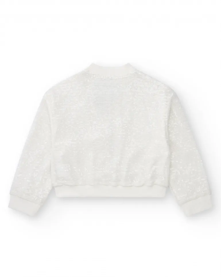 Veste pour fille en blanc avec sequins et fermeture éclair sur le devant.