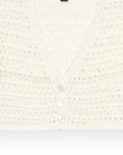 Veste pour fille en blanc avec boutons.