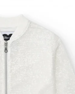 Veste pour fille en blanc avec sequins et fermeture éclair sur le devant.