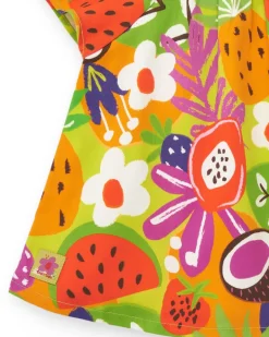 Vestido verde para niña con estampado tropical y mangas con volantes