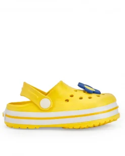 Zuecos para niña en amarillo con flor decorativa